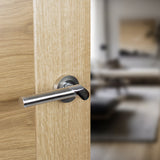 Quality image of Mediterranean Tunis Lever Door Handle on Round Rose - Satin Nickel/Polished Chrome | Sku. m125sncp | available from Trade Door Handles.