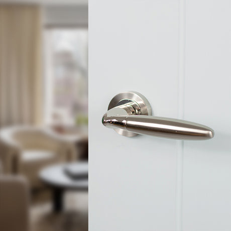 Quality image of Mediterranean Gibraltar Lever Door Handle on Round Rose - Satin Nickel/Polished Nickel | Sku. m83snnp | available from Trade Door Handles.