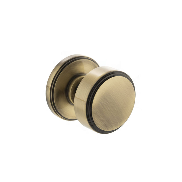 Quality image of Millhouse Brass Boulton Solid Brass Stepped Mortice Door Knob on Concealed Fix Rose - Antique Brass | Sku. mh350smkabsolid | available from Trade Door Handles.