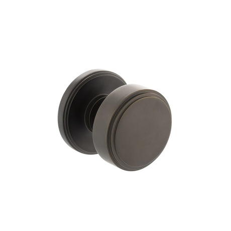 Quality image of Millhouse Brass Boulton Solid Brass Stepped Mortice Door Knob on Concealed Fix Rose - Urban Dark Bronze | Sku. mh350smkudbsolid | available from Trade Door Handles.