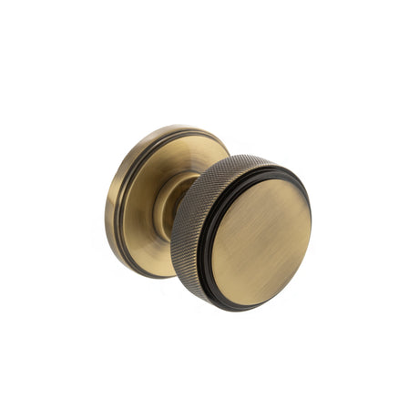 Quality image of Millhouse Brass Harrison Brass Knurled Mortice Knob on Concealed Fix Rose - Antique Brass | Sku. mh450ksmkab | available from Trade Door Handles.