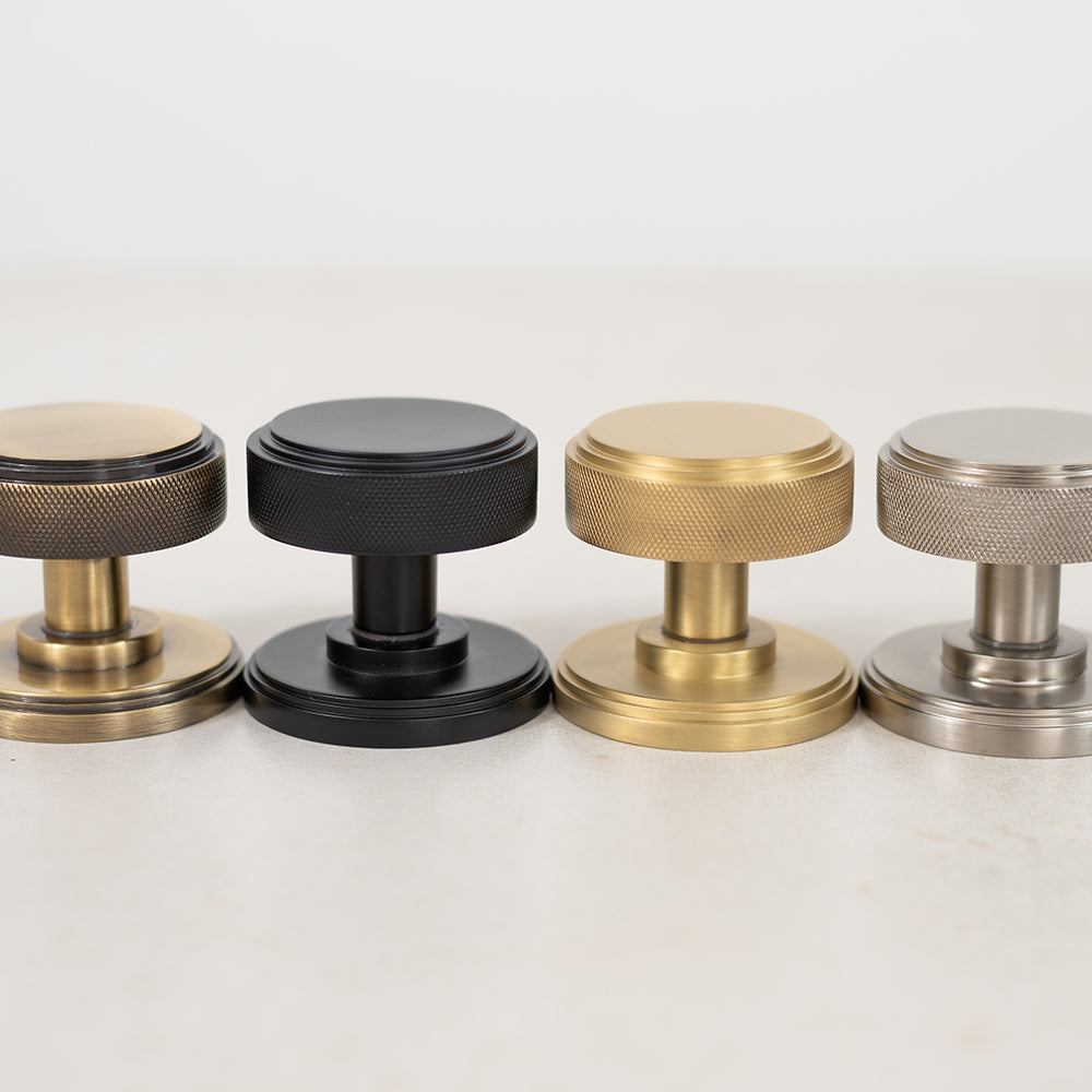 Quality image of Millhouse Brass Harrison Solid Brass Knurled Mortice Door Knob on Concealed Fix Rose - Antique Brass | Sku. mh450ksmkabsolid | available from Trade Door Handles.