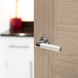 Quality image of Millhouse Brass Cartwright Knurled Lever Door Handle on Round Rose - Polished Chrome | Sku. mhr200pc | available from Trade Door Handles.
