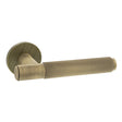 Quality image of Millhouse Brass Crompton Knurled Lever Door Handle on 5mm Slimline Round Rose - Yester Bronze | Sku. mhsr100yb | available from Trade Door Handles.