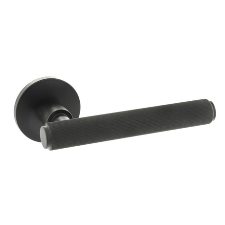 Quality image of Millhouse Brass Stephenson Knurled Lever Door Handle on 5mm Slimline Round Rose - Matt Black | Sku. mhsr250mb | available from Trade Door Handles.