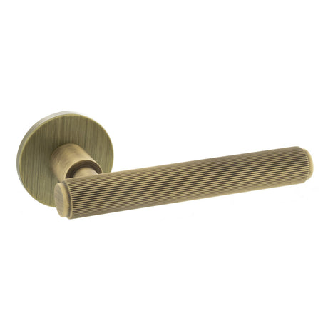 Quality image of Millhouse Brass Stephenson Knurled Lever Door Handle on 5mm Slimline Round Rose - Yester Bronze | Sku. mhsr250yb | available from Trade Door Handles.