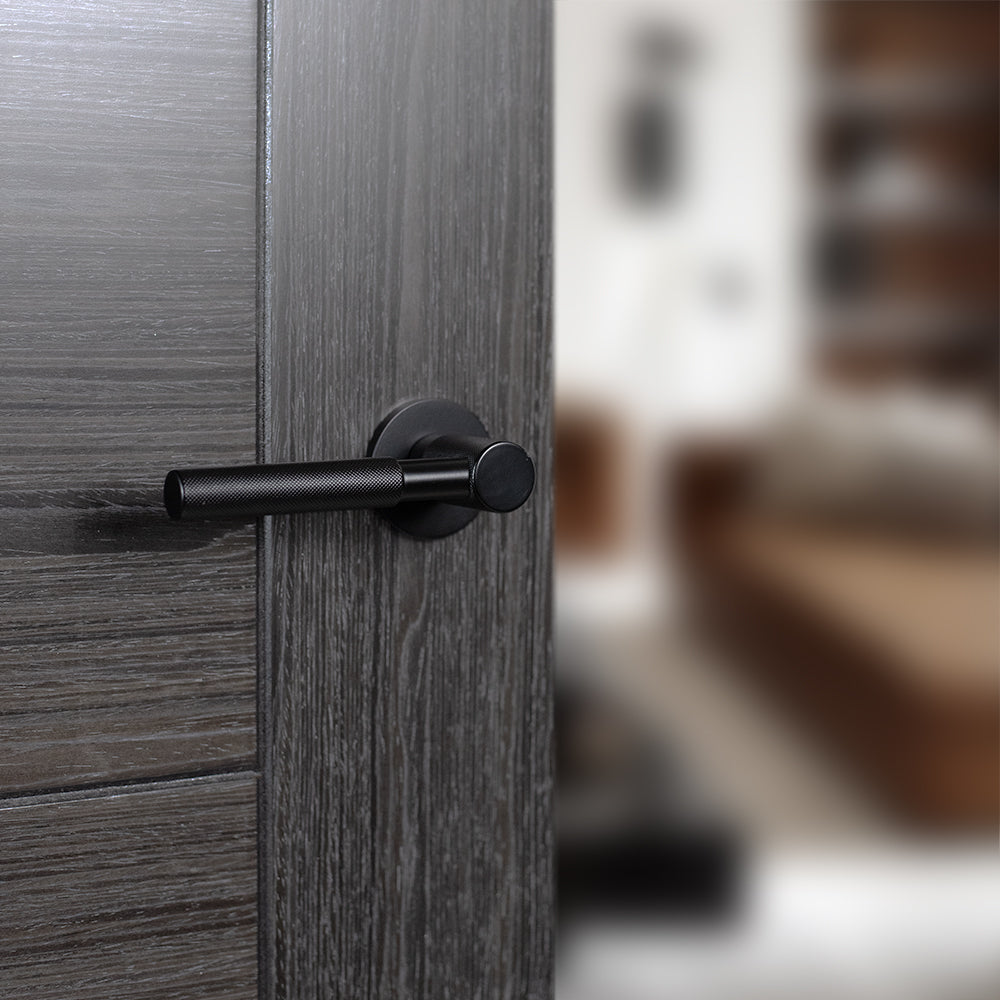 Quality image of Millhouse Brass Mason Knurled Lever Door Handle on 5mm Slimline Round Rose - Matt Black | Sku. mhsr500mb | available from Trade Door Handles.