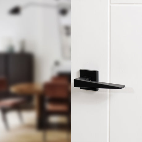 Quality image of Oro & Oro Ivy Lever Door Handle on Square Rose - Matt Black | Sku. o9615emb | available from Trade Door Handles.