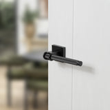 Quality image of Oro & Oro Aria Lever Door Handle on Square Rose - Matt Black | Sku. o10015emb | available from Trade Door Handles.