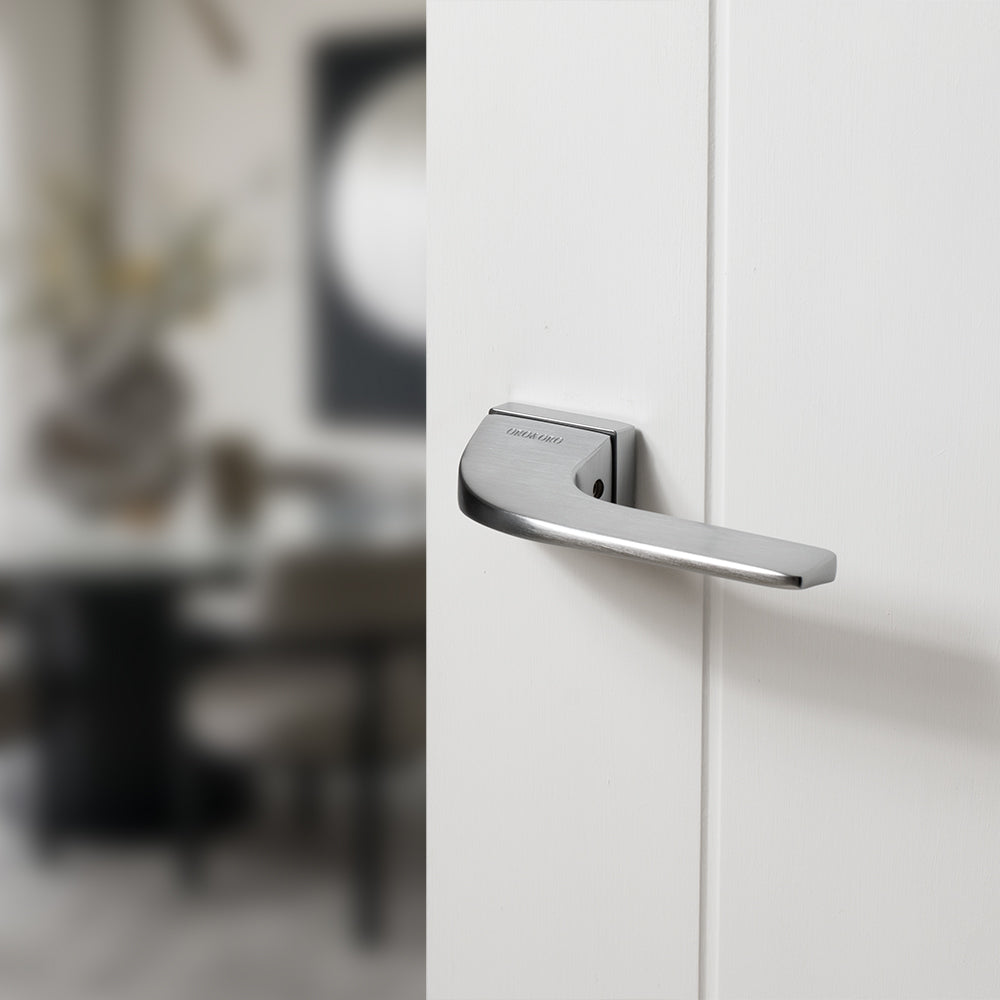 Quality image of Oro & Oro Oia Lever Door Handle on Square Rose - Satin Chrome | Sku. o12524esc | available from Trade Door Handles.
