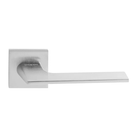 Quality image of Oro & Oro Unica Lever Door Handle on Square Rose - Satin Chrome | Sku. o6515esc | available from Trade Door Handles.