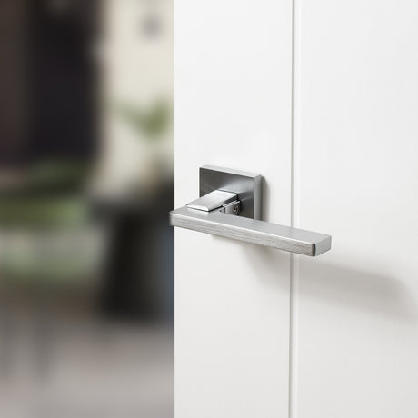 Quality image of Oro & Oro Alba Lever Door Handle on Square Rose - Satin Chrome | Sku. o6815esc | available from Trade Door Handles.