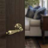 Quality image of Old English Wrexham Lever Door Handle on Round Rose - Matt Antique Brass | Sku. oe142mab | available from Trade Door Handles.