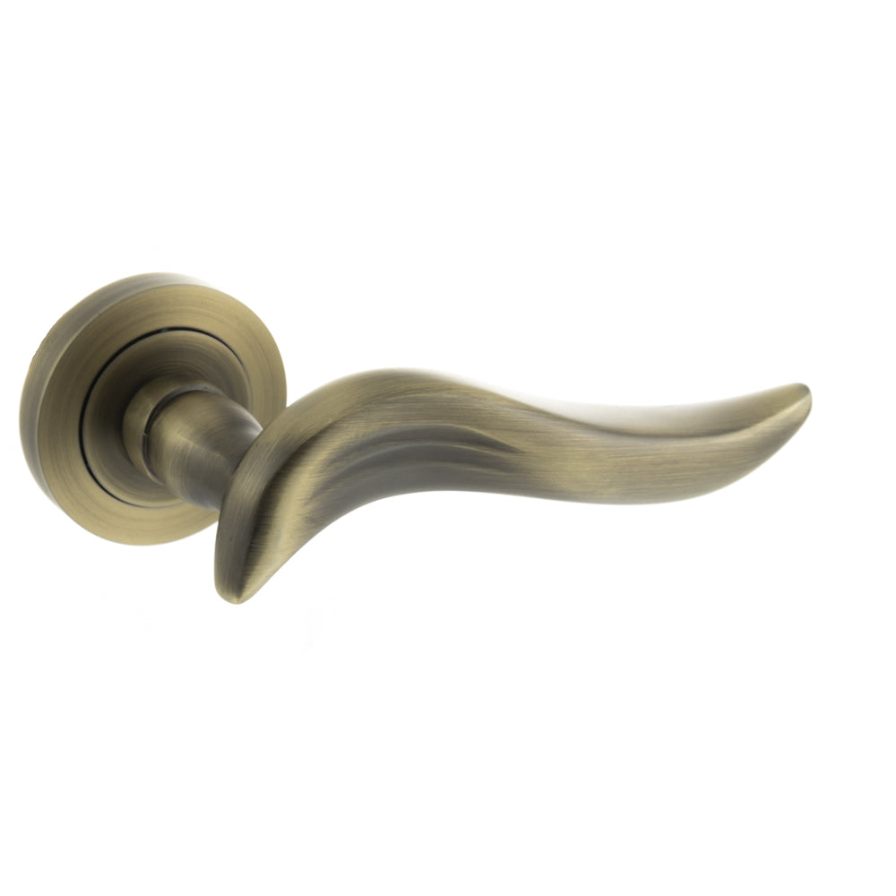 Quality image of Old English Oxford Lever Door Handle on Round Rose - Matt Antique Brass | Sku. oe144mab | available from Trade Door Handles.