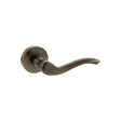 Quality image of Old English Warwick Lever Door Handle on Round Rose - Antique Brass | Sku. oe178ab | available from Trade Door Handles.
