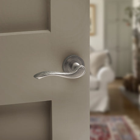 Quality image of Old English Warwick Lever Door Handle on Round Rose - Distressed Silver | Sku. oe178ds | available from Trade Door Handles.