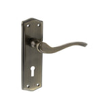 Quality image of Old English Warwick Key Lever Door Handle on Backplate - Antique Brass | Sku. oe178kab | available from Trade Door Handles.