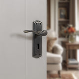 Quality image of Old English Warwick Key Lever Door Handle on Backplate - Matt Gun Metal | Sku. oe178kmbn | available from Trade Door Handles.