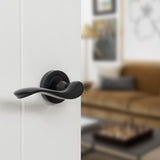Quality image of Old English Warwick Lever Door Handle on Round Rose - Matt Black | Sku. oe178mb | available from Trade Door Handles.