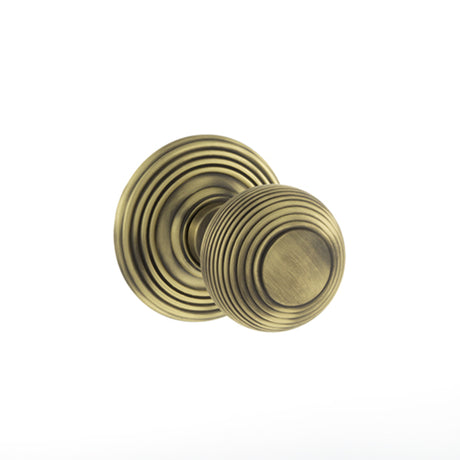 Quality image of Old English Ripon Solid Brass Reeded Mortice Knob on Concealed Fix Rose - Matt Antique Brass | Sku. oe50rmkmab | available from Trade Door Handles.