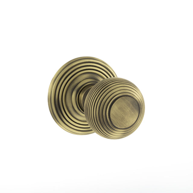 Quality image of Old English Ripon Solid Brass Reeded Mortice Knob on Concealed Fix Rose - Matt Antique Brass | Sku. oe50rmkmab | available from Trade Door Handles.