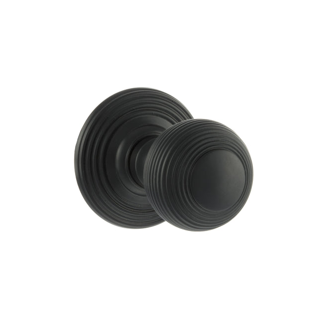 Quality image of Old English Ripon Solid Brass Reeded Mortice Knob on Concealed Fix Rose - Matt Black | Sku. oe50rmkmb | available from Trade Door Handles.