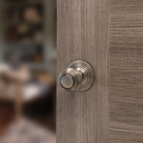Quality image of Old English Ripon Solid Brass Reeded Mortice Knob on Concealed Fix Rose - Matt Gun Metal | Sku. oe50rmkmbn | available from Trade Door Handles.
