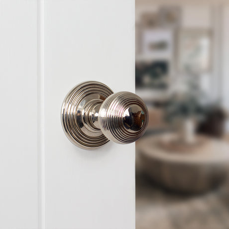 Quality image of Old English Ripon Solid Brass Reeded Mortice Knob on Concealed Fix Rose - Polished Nickel | Sku. oe50rmkpn | available from Trade Door Handles.
