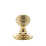 Quality image of Old English Ripon Solid Brass Reeded Mortice Knob on Concealed Fix Rose - Raw Brass | Sku. oe50rmkrb | available from Trade Door Handles.