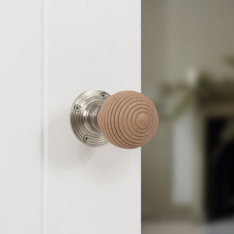 Quality image of Old English Bridlington Wood Reeded Beehive Door Knob on Face Fix Rose - Satin Nickel | Sku. oe57rmksn | available from Trade Door Handles.