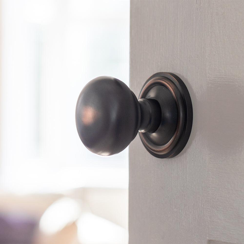 Quality image of Old English Harrogate Solid Brass Mushroom Mortice Knob on Concealed Fix Rose - Antique Copper | Sku. oe58mmkac | available from Trade Door Handles.
