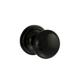Quality image of Old English Harrogate Solid Brass Mushroom Mortice Knob on Concealed Fix Rose - Black Nickel | Sku. oe58mmkbn | available from Trade Door Handles.