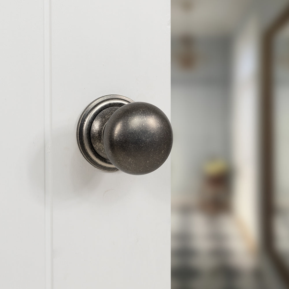 Quality image of Old English Harrogate Solid Brass Mushroom Mortice Knob on Concealed Fix Rose - Distressed Silver | Sku. oe58mmkds | available from Trade Door Handles.