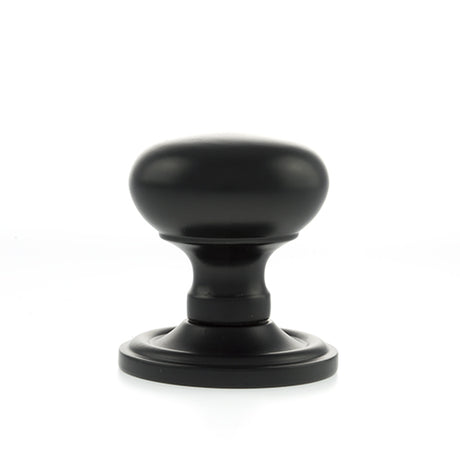 Quality image of Old English Harrogate Solid Brass Mushroom Mortice Knob on Concealed Fix Rose - Matt Black | Sku. oe58mmkmb | available from Trade Door Handles.