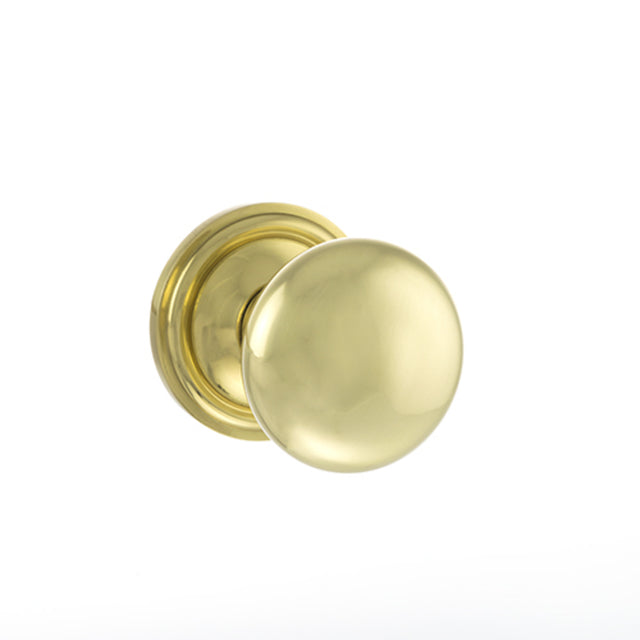 Quality image of Old English Harrogate Solid Brass Mushroom Mortice Knob on Concealed Fix Rose - Polished Brass | Sku. oe58mmkpb | available from Trade Door Handles.