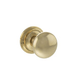 Quality image of Old English Harrogate Solid Brass Mushroom Mortice Knob on Concealed Fix Rose - Raw Brass | Sku. oe58mmkrb | available from Trade Door Handles.
