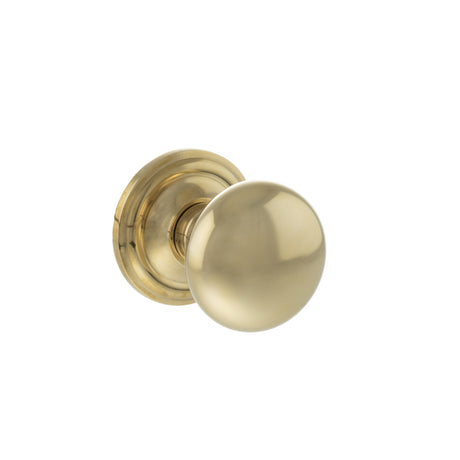 Quality image of Old English Harrogate Solid Brass Mushroom Mortice Knob on Concealed Fix Rose - Raw Brass | Sku. oe58mmkrb | available from Trade Door Handles.