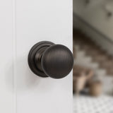 Quality image of Old English Harrogate Solid Brass Mushroom Mortice Knob on Concealed Fix Rose - Urban Bronze | Sku. oe58mmkub | available from Trade Door Handles.