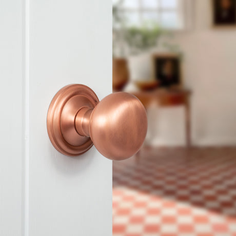 Quality image of Old English Harrogate Solid Brass Mushroom Mortice Knob on Concealed Fix Rose - Urban Satin Copper | Sku. oe58mmkusc | available from Trade Door Handles.
