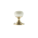 Quality image of Old English Skipton Porcelain Cream Crackle Door Knob on Face Fix Rose - Antique Brass | Sku. oe59cmkcab | available from Trade Door Handles.