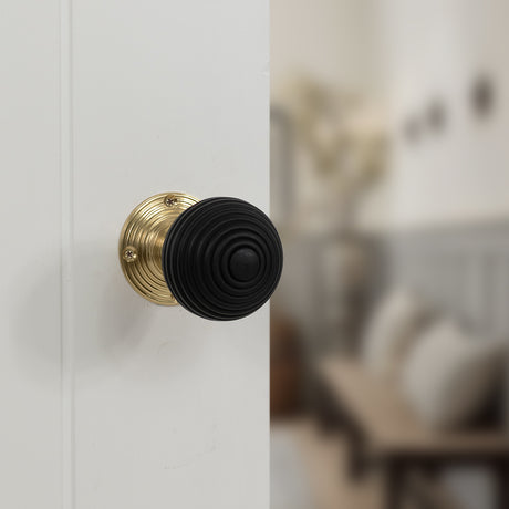 Quality image of Old English Whitby Door Knob Pack (Latch Set - 3" HD Latch, 3" Fire Rated Hinges x3) - Polished Brass | Sku. adpoe60rremkpb54 | available from Trade Door Handles.