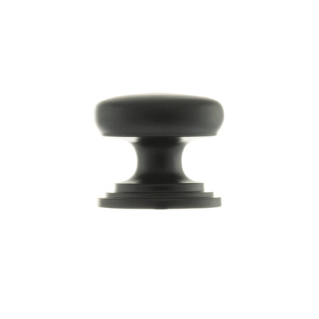 Quality image of Old English Lincoln Solid Brass Victorian Knob 32mm on Concealed Fix - Matt Black | Sku. oec1232mb | available from Trade Door Handles.