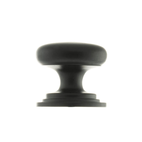Quality image of Old English Lincoln Solid Brass Victorian Knob 38mm on Concealed Fix - Matt Black | Sku. oec1238mb | available from Trade Door Handles.
