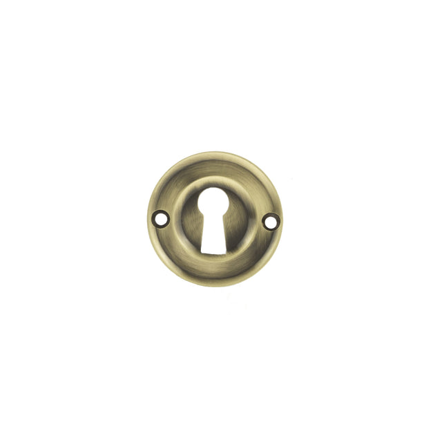 Quality image of Old English Solid Brass Open Key Hole Escutcheons - Antique Brass | Sku. oerkeab | available from Trade Door Handles.