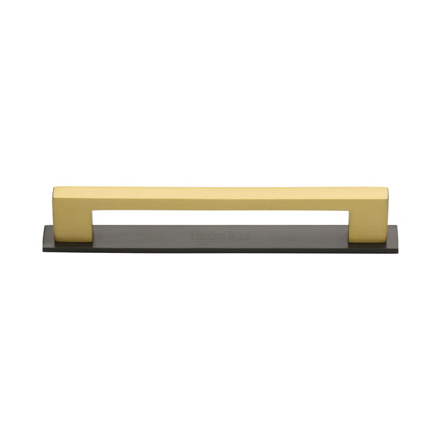 High quality image of the Heritage Brass Cabinet Pull Metro Design with Plate 128mm CTC Matt Bronze/Satin Brass Finish | Sku. pl0337-128-bsb | Discounted prices available from Trade Door Handles