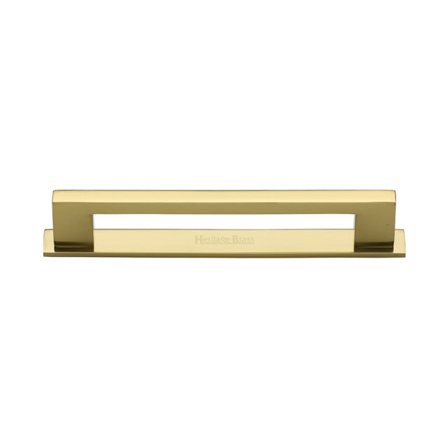 High quality image of the Heritage Brass Cabinet Pull Metro Design with Plate 128mm CTC Polished Brass Finish | Sku. pl0337-128-pb | Discounted prices available from Trade Door Handles