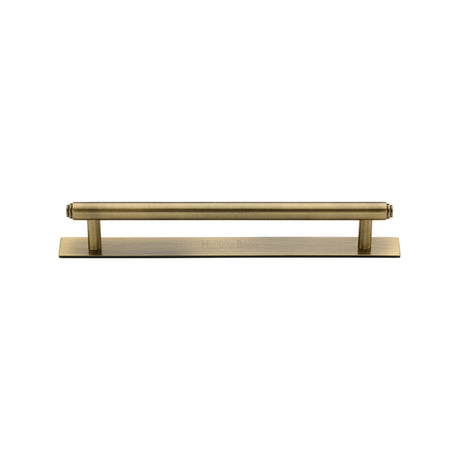 High quality image of the Heritage Brass Cabinet Pull Step Design with Plate 128mm CTC Antique Brass Finish | Sku. pl4410-128-at | Discounted prices available from Trade Door Handles