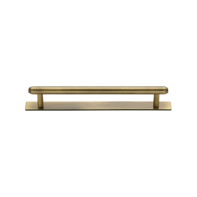 High quality image of the Heritage Brass Cabinet Pull Step Design with Plate 128mm CTC Antique Brass Finish | Sku. pl4410-128-at | Discounted prices available from Trade Door Handles