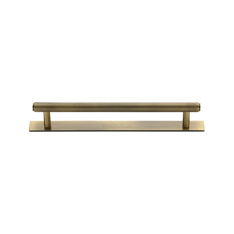 High quality image of the Heritage Brass Cabinet Pull Knurled Design with Plate 128mm CTC Antique Brass Finish | Sku. pl4458-128-at | Discounted prices available from Trade Door Handles