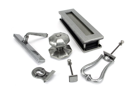 This image shows a range of door accessories in pewter made by From the Anvil